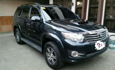 TOYOTA Fortuner G AT 2015 model smells new good as new