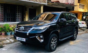 Black Toyota Fortuner 2016 Automatic Diesel for sale in Quezon City