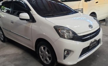 White Toyota Wigo 2016 for sale in Quezon City