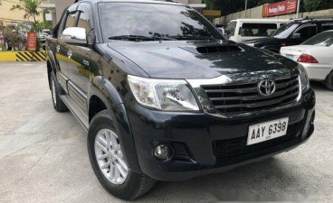 Selling Black 2014 Toyota Hilux at 100000 km 