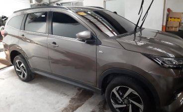 Selling Bronze Toyota Rush 2019 Automatic Gasoline at 10000 km in Quezon City