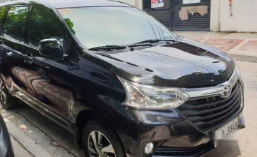 Selling Black Toyota Avanza 2018 Automatic Gasoline for sale in Quezon City