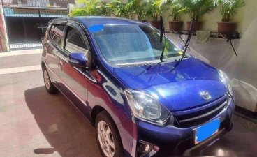 Blue Toyota Wigo 2016 at 26000 km for sale in Makati