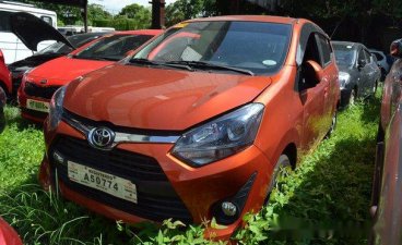 Orange Toyota Wigo 2018 for sale in Quezon City 