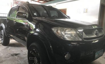 Black Toyota Hilux 2011 at 40000 km for sale