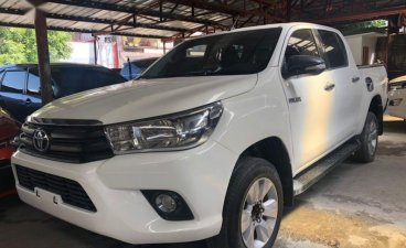 Selling White Toyota Hilux 2016 in Quezon City