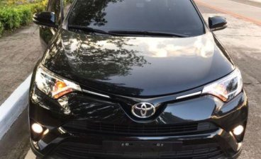 Selling Black Toyota Rav4 2016 Automatic Gasoline in Quezon City