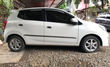 Selling White Toyota Wigo 2017 in Quezon City