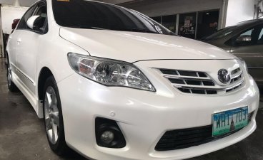 White Toyota Corolla Altis 2013 for sale in Quezon City 