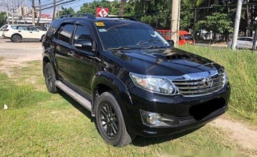 Black Toyota Fortuner 2015 at 37000 km for sale 