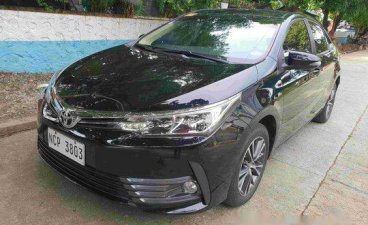 Black Toyota Corolla Altis 2018 at 15000 km for sale