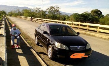 Black Toyota Corolla Altis 2005 at 125000 km for sale