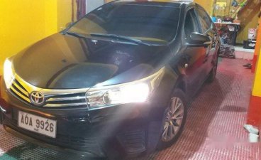 Selling Black Toyota Corolla Altis 2014 in Pasay
