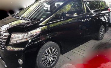 Black Toyota Alphard 2016 at 23000 km for sale