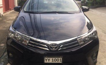 Selling Black Toyota Corolla Altis 2016 at 42000 km