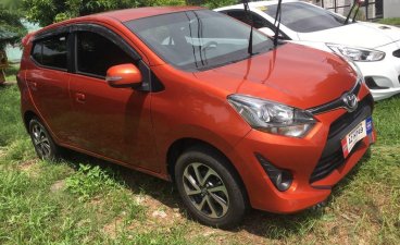 Orange Toyota Wigo 2018 for sale in Cainta