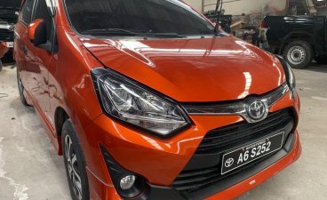 Orange Toyota Wigo 2018 for sale in Quezon City 