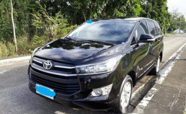 Selling Black Toyota Innova 2017 at 35000 km