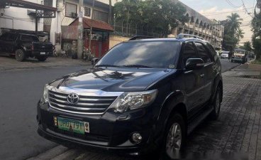 Selling Black Toyota Fortuner 2013 at 24952 km