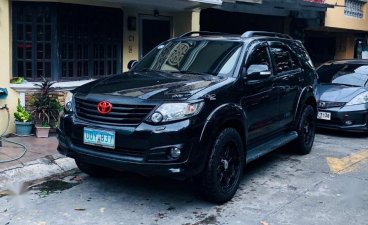 Selling Black Toyota Fortuner 2012 in Quezon City