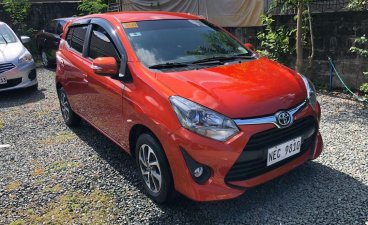 Orange Toyota Wigo 2019 for sale in Quezon City