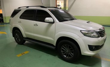 Pearl White Toyota Fortuner 2013 for sale in Makati