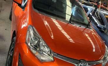 Selling Orange Toyota Wigo 2019 in Quezon City