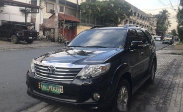 Selling Black Toyota Fortuner 2013 Automatic Gasoline 