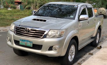 Selling Pearlwhite Toyota Hilux 2013 in Meycauayan