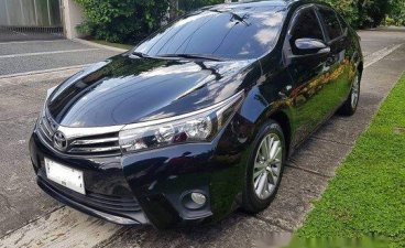 Black Toyota Corolla altis 2015 for sale in Manual