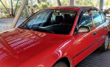 Red Toyota Corolla 2013 for sale in Las Pinas