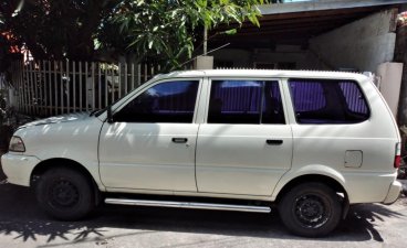 White Toyota Revo 2011 for sale in Imus