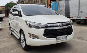 Selling Pearl White Toyota Innova 2017 in Quezon City