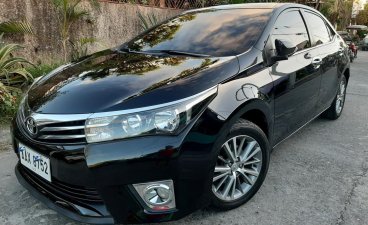 Selling Black Toyota Corolla Altis 2014 in Pandan