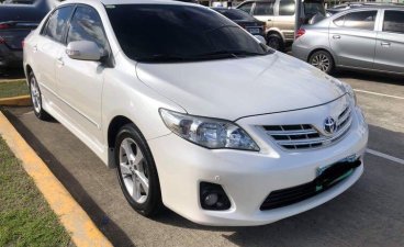 Pearl White Toyota Corolla altis 2012 for sale in Manila