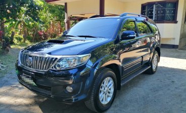 Black Toyota Fortuner 2012 for sale in Santo Tomas