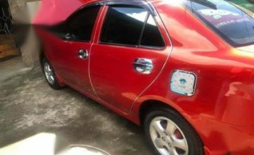 Selling Orange Toyota Vios in Manila