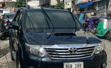 Selling Black Toyota Fortuner in Quezon City