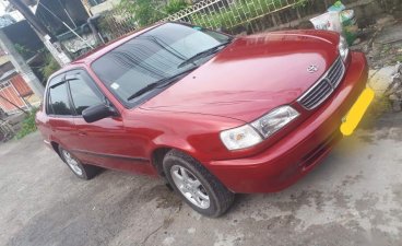 Sell Red Toyota Corolla in Quezon City