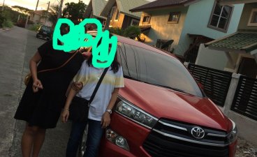 Selling Red Toyota Innova in Manila