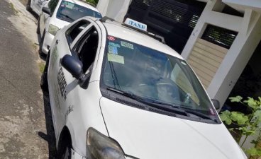 Selling White Toyota Vios in Quezon City
