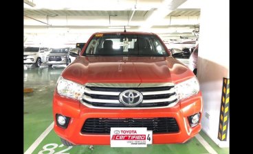 Orange Toyota Hilux 2018 at 27364 km for sale in Manila