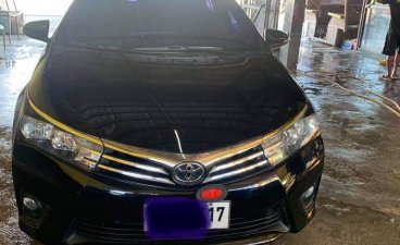 Selling Black Toyota Corolla Altis 2014 in Gapan