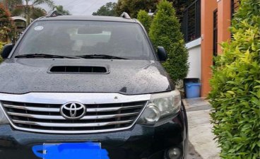 Selling Black Toyota Fortuner 2014 in Davao