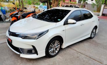 White Toyota Altis 2018