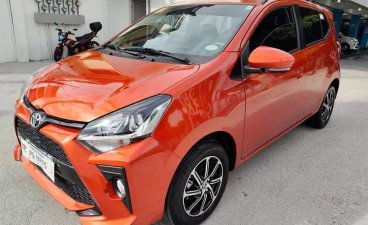Selling Orange Toyota Wigo 2021 in Manila