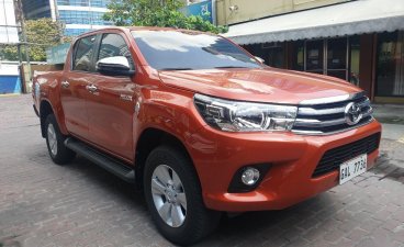 Orange Toyota Hilux 2019 for sale in Pasig