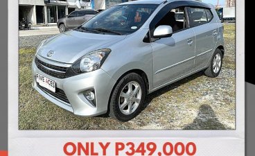 Selling Brightsilver Toyota Wigo 2016 in Mandaue