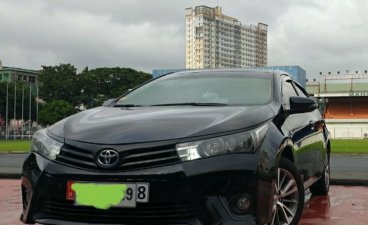 Selling Black Toyota Corolla Altis 2015 in Marikina
