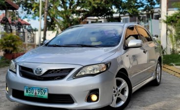 Selling Pearl White Toyota Corolla Altis 2013 in Caloocan